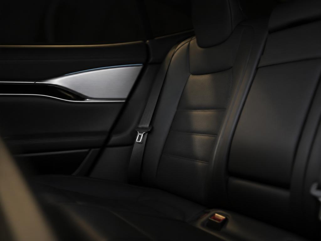 Leather seat with brushed-aluminum trim and ambient lighting